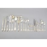 A TWELVE PLACE .800 STD SILVER CUTLERY SET, comprising: 12 dinner knives and forks, 12 entrée knives