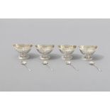 A SET OF FOUR VICTORIAN SILVER OPEN SALTS, LONDON 1880, E.C.B., fold-over reeded rims, reeded body