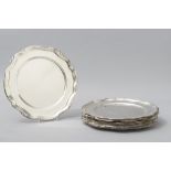 A SET OF TWELVE WMF SILVERPLATE UNDERPLATES, with wavy embossed rims, plain wells, 30cm (