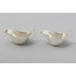 A PAIR OF GEORGE VI SILVER SAUCE BOATS, BIRMINGHAM 1937, B.B.S. Ltd., with fold-over rim, C-form