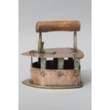A 19th CENTURY CAPE COPPER AND BRASS COAL IRON, the vented sides above a lifting lid with an iron