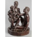 PETER ISRAEL CHIKUMBIRIKE (ZIMBABWEAN: 1958 - ), FAMILY GROUP, wood carved sculpture, on a