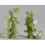 A PAIR OF CARVED CHINESE JADE FIGURES OF FLOWER MAIDENS, EARLY 20th CENTURY, in flowing robes,