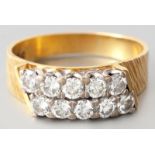 AN 18CT YELLOW GOLD AND DIAMOND RING, two rows of five round brilliant cut diamonds, claw-set with