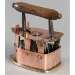 A 19th CENTURY CAPE COPPER IRON, the top with a rotating clasp, iron support and handle above vented