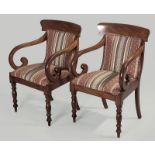 A PAIR OF EARLY VICTORIAN MAHOGANY ARMCHAIRS, the curved top-rails above upholstered backs and