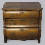 A 19th CENTURY DUTCH OAK BOMBE CHEST OF DRAWERS, the serpentine top above three curved drawers