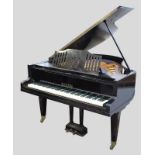 A 1930's BLACK LACQUERED GRAND PIANO, by Julius Bluthner, Leipzig, the metal frame housed in a