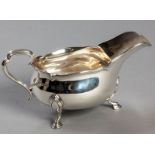 AN EDWARDIAN SILVER SAUCE BOAT, SHEFFIELD 1904, ATKIN BROS., serpentine reeded fold-over rim,