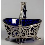 AN EDWARDIAN SILVER BASKET, BIRMINGHAM1903, LEVI & SALLIMAN, with a swing-over handle with floral