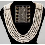 A FIVE STRAND PEARL NECKLACE, with silver and marcasite clasp and two interspaced bars, 44cm (