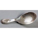 A VICTORIAN SILVER CADDY SPOON, LONDON 1870, D.J.S., with a shell-form bowl and handle, 9cm (