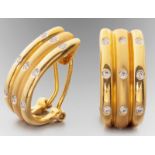 A PAIR OF 18ct YELLOW GOLD AND DIAMOND HALF-HOOP CLIP-ON EARRINGS, three bars each set with three