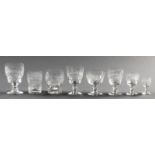 A COLLECTION OF STUART CRYSTAL GLASSES, composed of 12 champagne bowls, 11 white wine glasses, 14