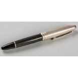 A MONT BLANC MEISTESTUCK 4810 FOUNTAIN PEN, the herringbone black body with a viewing chamber and