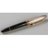 A MONT BLANC MEISTESTUCK 4810 FOUNTAIN PEN, the stainless body with a viewing chamber and 18ct