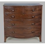 A GEORGE III MAHOGANY BOW-FRONTED CHEST OF DRAWERS, the well-figured top above two short and three