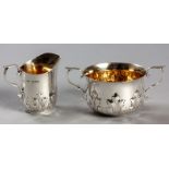 AN EDWARDIAN SILVER CREAMER AND SUGAR BASIN, LONDON 1903, JOHN HENRY RAWLINGS, with gilded