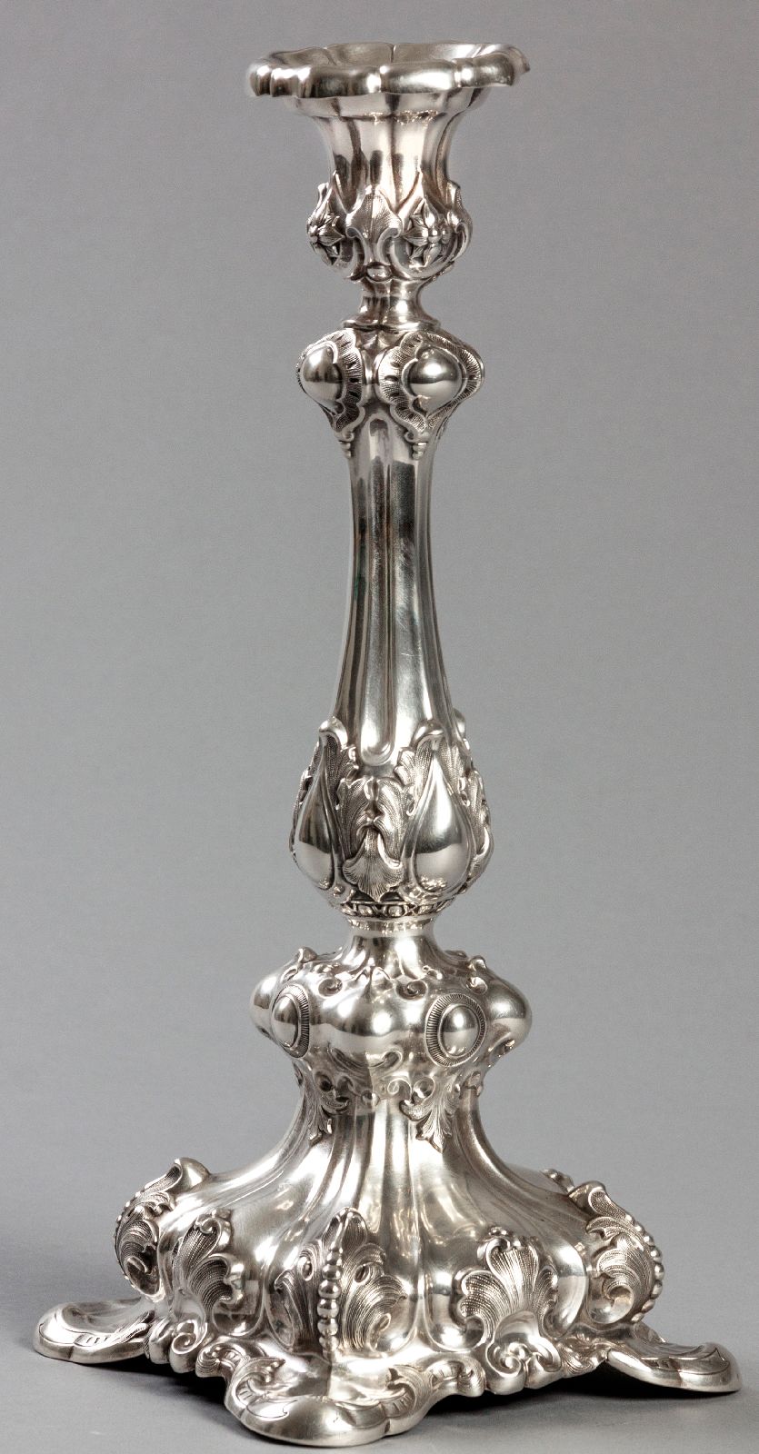 AN .800 STD GERMAN SILVER CANDLESTICK, 13 loth, removable wax pans with linen-fold rim, the stem and