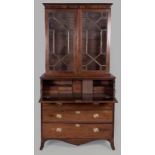 A GEORGE III MAHOGANY BUREAU BOOKCASE, a marriage piece, the upper section with a moulded pediment