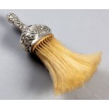 AN EDWRADIAN SILVER CRUMB BRUSH, BIRMINGHAM 1901, H. MATTHEWS, the handle profusely embossed with