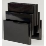 A GIOTTO STOPPINO KARTELL MAGAZINE RACK, 1970, in black colour with a circular handle and six