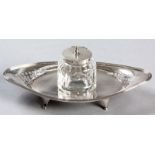 A VICTORIAN SILVER AND GLASS INKWELL, SHEFFIELD 1898, H.A., the oval stand with an applied reeded