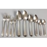 A TWELVE PLACE SILVER OLD ENGLISH PATTERN CUTLERY SET, VARIOUS DATES AND MAKERS, composed of 12