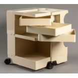 A BIEFFEPLAST BOBY TROLLEY BY JOE COLOMBO, 1970, in ivory colour, the square form housing various