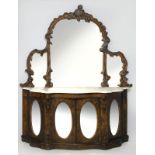 A VICTORIAN WALNUT CREDENZA SERVER, the carved arched mirror frame above a cream marble surface, the