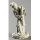 A LATE 18th CENTURY CHINESE BLANC-DE-CHINE FIGURE, of a woman holding a bottle vase, standing on a