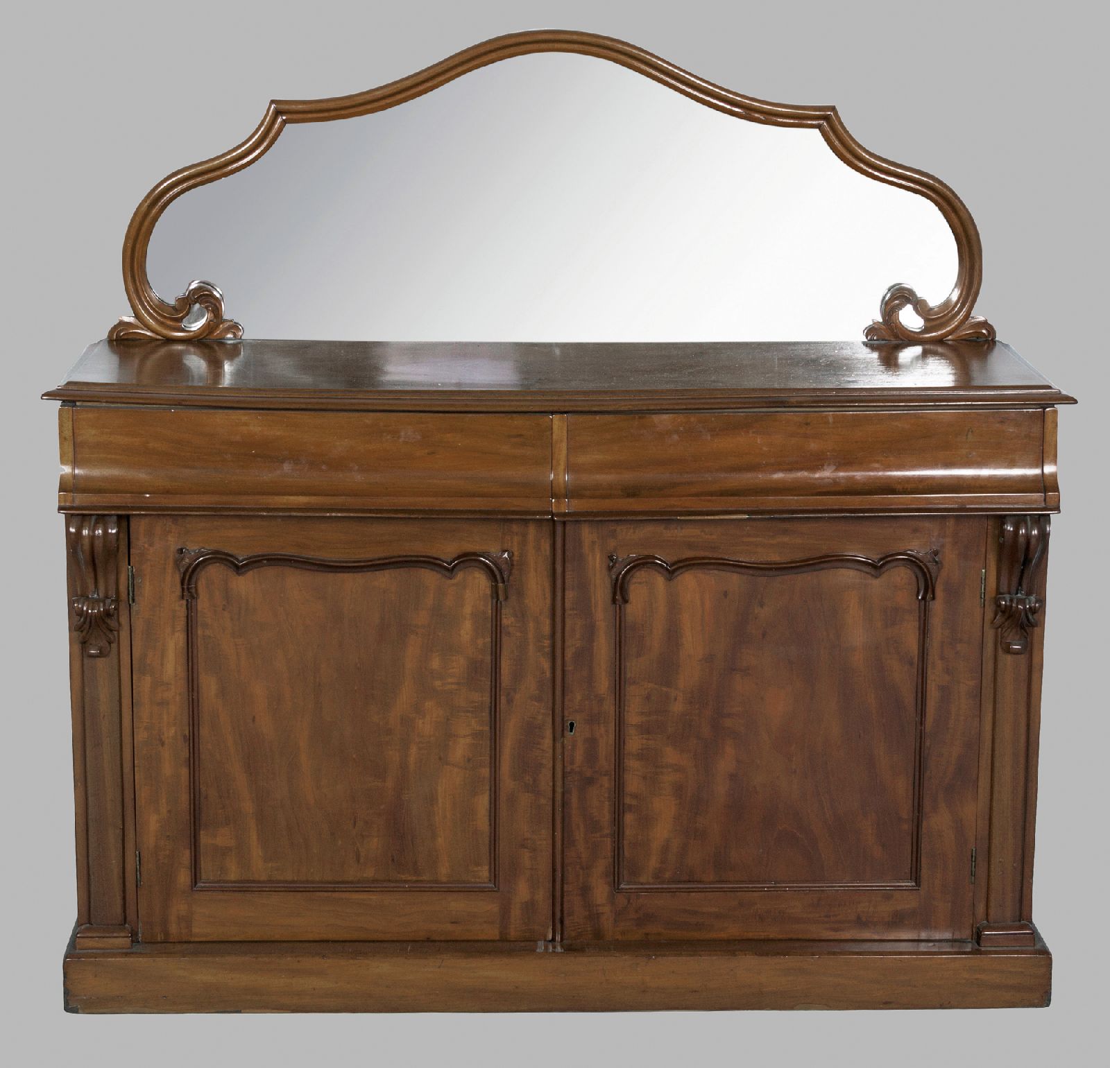 A VICTORIAN MAHOGANY SERVER, the moulded top surmounted by a framed mirror above two flush drawers