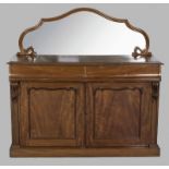 A VICTORIAN MAHOGANY SERVER, the moulded top surmounted by a framed mirror above two flush drawers