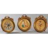 A SET OF THREE MID-19th CENTURY FRENCH ORMOLU CIRCULAR PICTURE FRAMES, of fine quality with a bow on