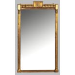 A RECTANGULAR BEVELLED MIRROR, set in a pierced Italinate rococo-style frame depicting intertwined