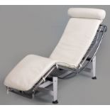 A LE CORBUSIER-STYLE RECLINER, the ivory leather upholstery mounted on typical chrome tubing resting