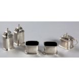 A GEORGE V FIVE PIECE SILVER CRUET SET, CHESTER 1930, REID & SONS, NEWCASTLE-ON-THYME, composed of