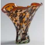 A POLISH AMBER GLASS VASE, of organic form, decorated with ivory and brown daubs, bearing maker's