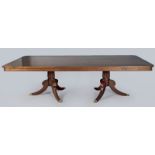 A MAHOGANY DINING TABLE BY PIERRE CRONJÉ, the well-figured rectangular top with a beaded frieze
