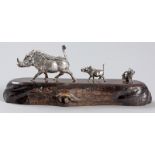 A PATRICK MAVROS SILVER SCULPTURE, of a female warthog with her two piglets, mounted on a