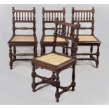 A SET OF FOUR ENGLISH OAK SPINDLE BACK DINING CHAIRS, the backs with turned pillars and