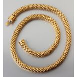 AN 18ct YELLOW GOLD NECKLACE, of rope form, tongue and groove clasp, 46cm (length), 62.5g.