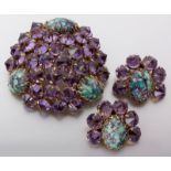 A VINTAGE AMETHYST AND TURQUOISE BROOCH, BY SCHREINER, NEW YORK, comprising of thirty three claw-set