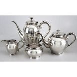 A FOUR PIECE .835STD SILVER TEA AND COFFEE SERVICE, comprising: of a teapot, coffee pot, sugar