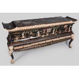 AN ORIENTAL-STYLE SIDEBOARD OF PAGODA SHAPE, the top with an ivoried gilt frieze above a series of