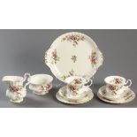 A ROYAL ALBERT "MOSS ROSE" PATTERN TEN PLACE TEA SET, comprising: of ten cups and saucers, ten