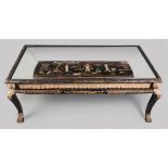 AN ORIENTAL -STYLE RECTANGULAR DINING TABLE, the moulded edge with an out-glass top above canted