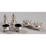 A SIX PIECE SILVERPLATE CRUET SET, comprising: of two open salts, two mustard pots and two