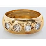 AN 18CT YELLOW GOLD AND DIAMOND RING, with four tube-set brilliant cut diamonds of approximately 0.