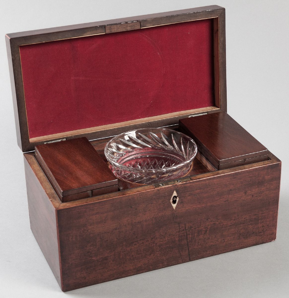 A 19TH CENTURY ENGLISH MAHOGANY TEA CADDY, CIRCA 1840, with two containers and a glass mixing